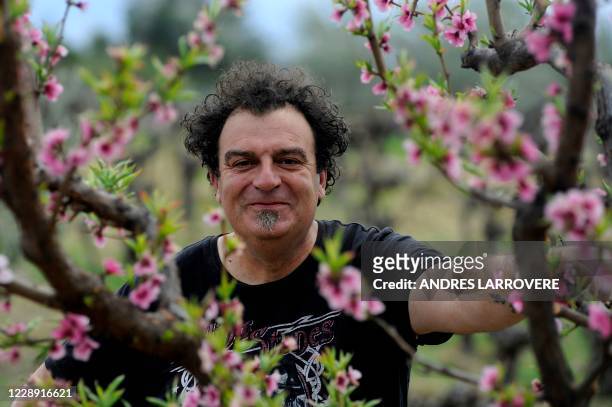 Argentinian agronomist and winemaker Alejandro Vigil poses at his Casa Vigil winery, restaurant and art space, in Chachingo, Maipu department,...
