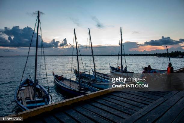 Fishing boats are seen during sunset in Puerto Cabezas , North Caribbean Coast Autonomous Region, Nicaragua, on September 23, 2020. - Over half a...