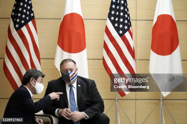 Michael Pompeo, U.S. Secretary of State, right, speaks with Toshimitsu Motegi, Japan's foreign minister, prior to a meeting with Japan's Prime...