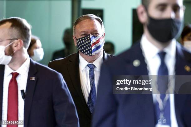 Michael Pompeo, U.S. Secretary of State, middle, arrives for a meeting with Japan's Prime Minister Yoshihide Suga, not pictured, in Tokyo, Japan, on...