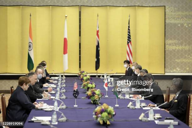 Toshimitsu Motegi, Japan's foreign minister, second right, speaks to Michael Pompeo, U.S. Secretary of State, second left, Marise Payne, Australia's...
