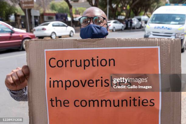 Civilians protest at the Bloemfontein Magistrate?s Court during the court appearance of the Free State asbestos project suspects on October 02, 2020...