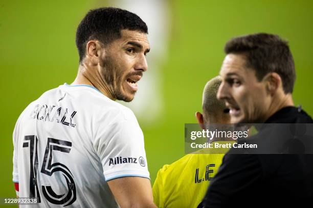 Michael Boxall of Minnesota United speaks with a referee after a collision between Randall Leal of Nashville SC and Jose Aja during the second half...