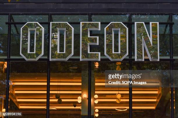 Sign on the Odeon Luxe in Londons Leicester Square. The Odeon cinema chain is cutting the opening hours of some of its cinemas in the UK and Ireland...