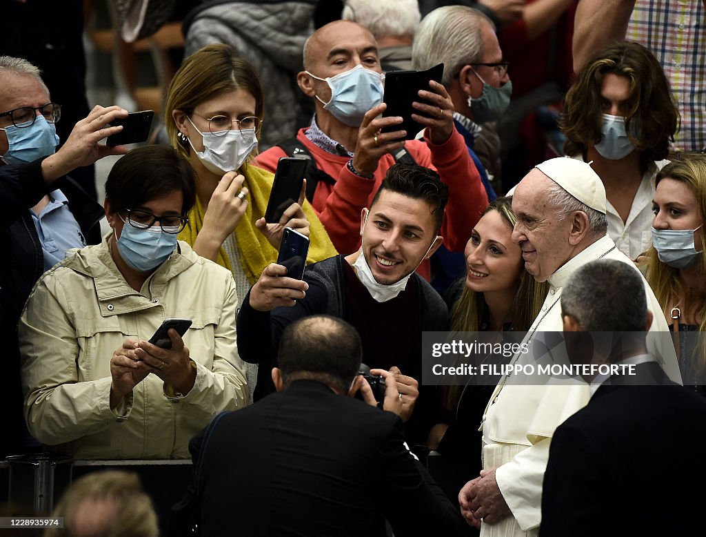 Vatican Mask Worshippers pull down their face mask for a selfie with Pope Francis ...