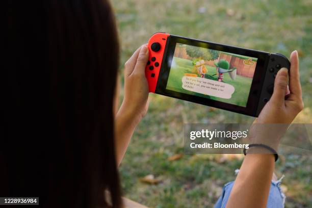 New Horizons on a Nintendo Switch game console in Seattle, Washington, U.S,, on Wednesday, Aug. 26, 2020. The game became a hit game during the...