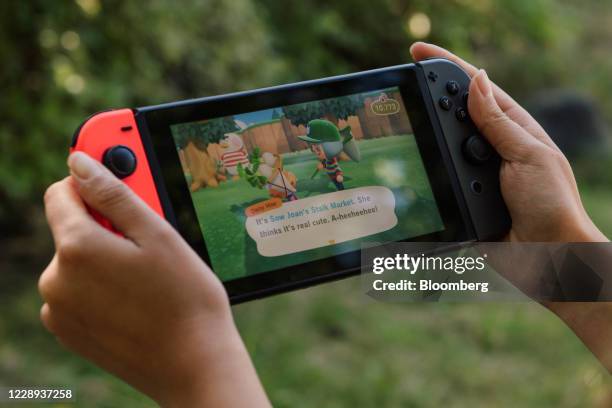 New Horizons on a Nintendo Switch game console in Seattle, Washington, U.S,, on Wednesday, Aug. 26, 2020. The game became a hit game during the...