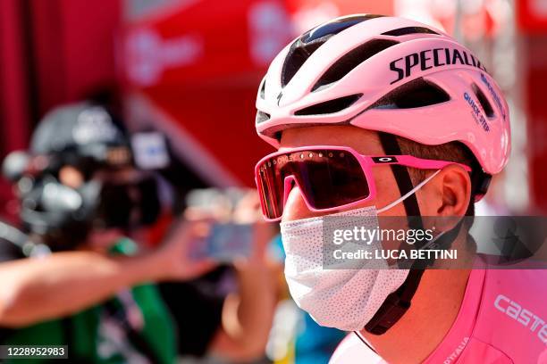 Team Deceuninck rider Portugal's Joao Almeida wearing the Pink Jersey waits for the start of the 6th stage of the Giro d'Italia 2020 cycling race, a...