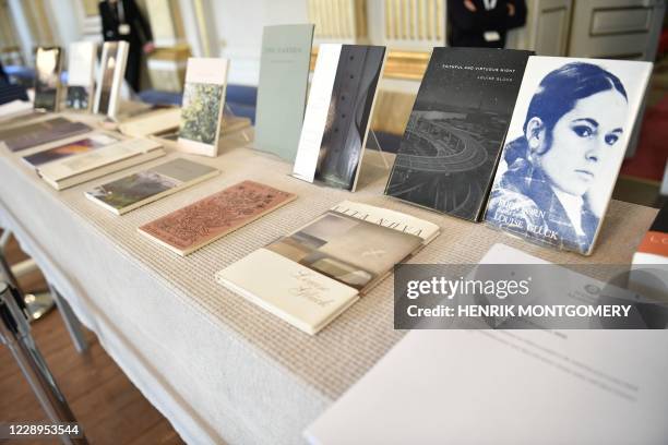 Louise Gluck's books are on display during the announcement of the 2020 Nobel Prize in literature at the Swedish Academy in Stockholm on October 8,...