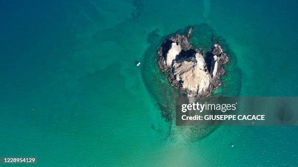 An aerial view taken on October 7, 2020 shows Snoopy Island, known for its sandy public beaches for camping and corals that attract snorklers, off...