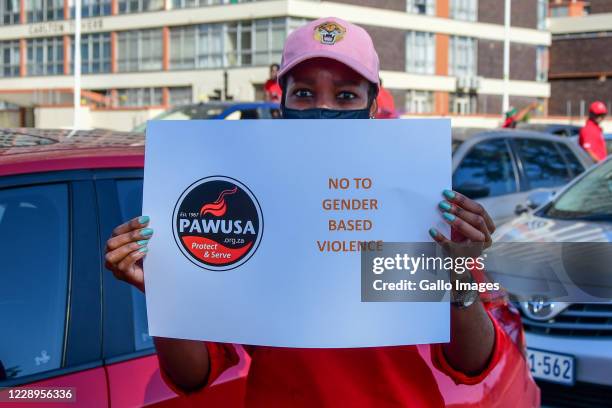 Against gender based violence in the motorcade slowing traffic in the CBD during the Congress of South African Trade Unions mass strike action on...