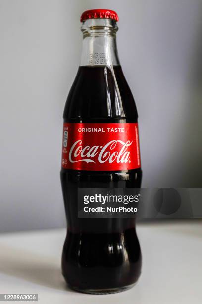 Coca-Cola bottle is seen in this illustration photo taken in Krakow, Poland on October 8, 2020.