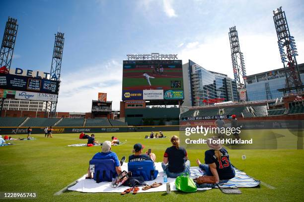 Atlanta Braves fans watch Game Three of the National League Division Series between the Miami Marlins and Atlanta Braves at Truist Park on October 8,...