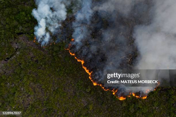 Aerial view showing a fire at the Chapada Diamantina region, between the cities of Andarai and Mucuge, in Bahia state, northeastern Brazil, on...