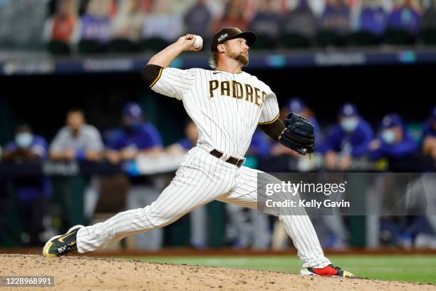 Trevor Rosenthal of the San Diego Padres pitches in the ninth inning during Game 3 of the NLDS between the Los Angeles Dodgers and the San Diego...