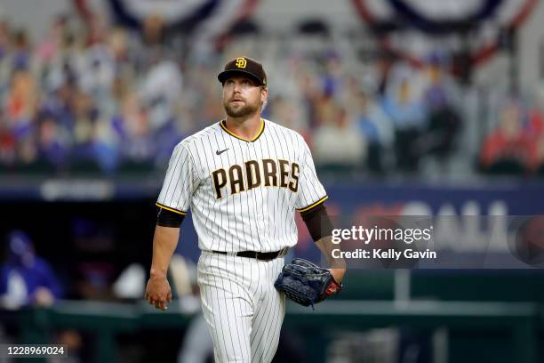 Trevor Rosenthal of the San Diego Padres reacts in the ninth inning during Game 3 of the NLDS between the Los Angeles Dodgers and the San Diego...