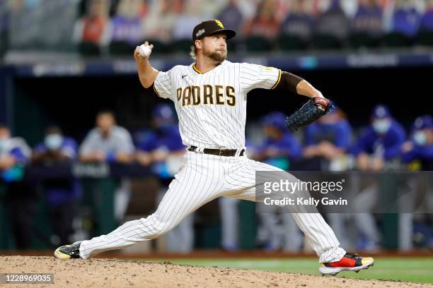Trevor Rosenthal of the San Diego Padres pitches in the ninth inning during Game 3 of the NLDS between the Los Angeles Dodgers and the San Diego...