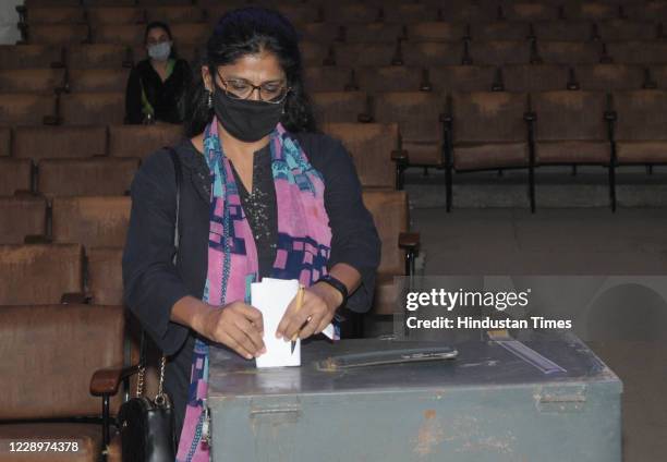Faculty members take part in the Panjab University Teachers Association election at English Auditorium inside Panjab University campus, on October 8,...