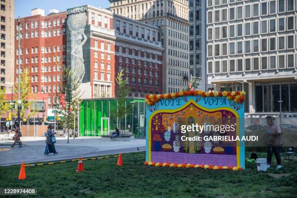 Group of murals encouraging Philadelphians to vote, called To The Polls, are displayed in Love Park during early voting at City Hall on October 7 in...