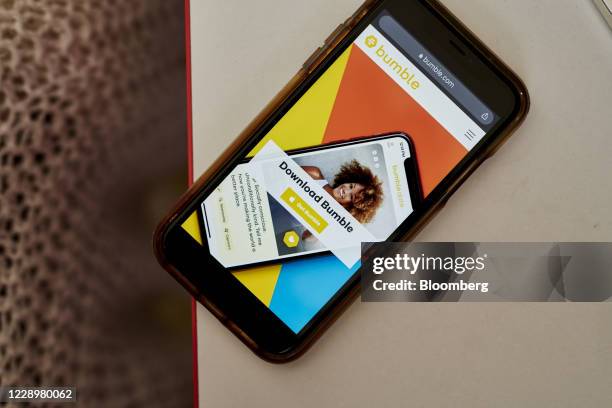 The website home screen for Bumble is displayed on a smartphone in an arranged photograph taken in the Brooklyn borough of New York, U.S., on Friday,...