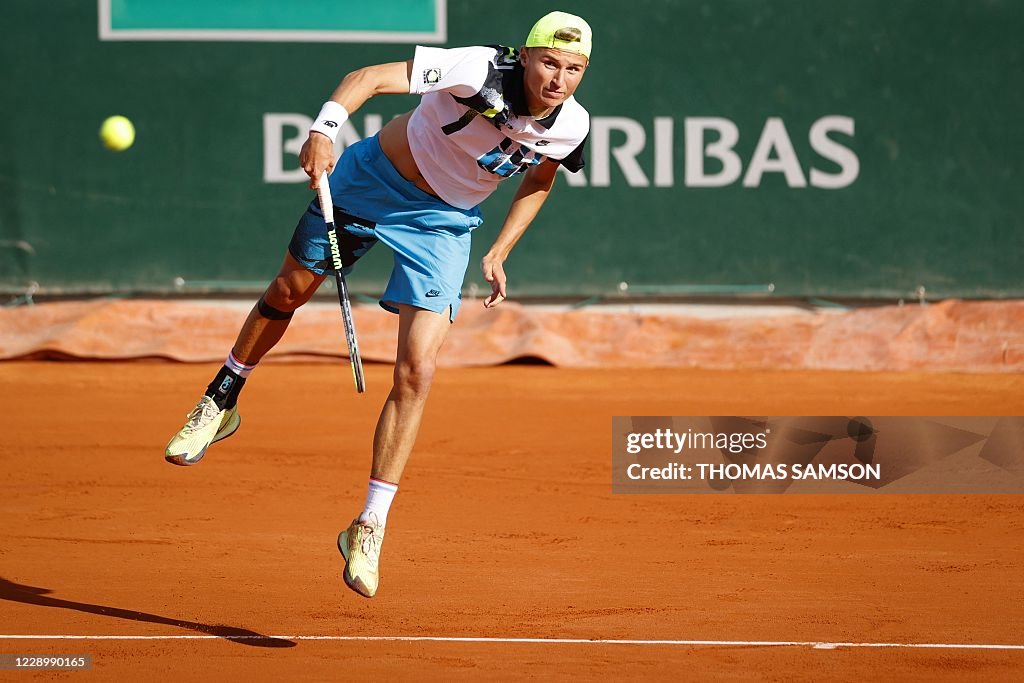 Leandro Riedi Switzerland's Leandro Riedi serves the ball to Switzerland's Dominic ...