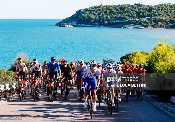The peloton rides during the 8th stage of the Giro d'Italia 2020 cycling race, a 200-kilometer route between Giovinazzo and Vieste on October 10,...