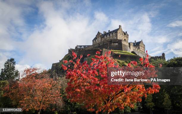 Trees in Princes Street Gardens, underneath Edinburgh Castle, display their Autumn colours.