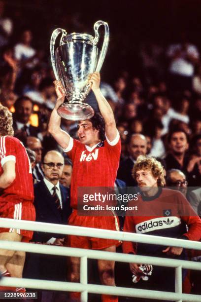 Felix Magath of Hamburger SV left the trophy after the victory during European Cup Final match between Hamburger SV and Juventus, at Olympic Stadium,...
