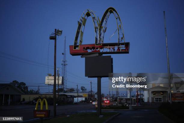 McDonald's Corp. Signage previously damaged by Hurricane Laura stands after Hurricane Delta made landfall in Lake Charles, Louisiana, U.S., on...