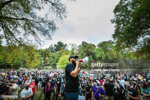 Rep. Charles Booker speaks to protesters gathering before a march to the Breonna Taylor memorial at Jefferson Square Park on October 10, 2020 in...