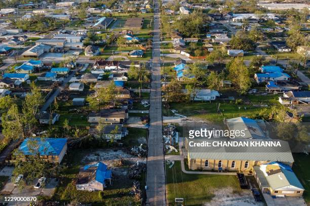 Aerial view of devastated houses after Hurricane Delta passed through the area near Lake Charles, Louisiana on October 10, 2020. - Hurricane Delta...