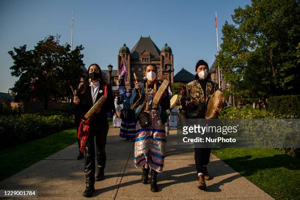 As part of a national day of action, members of the Six Nations and allies march from Queens Park down University Avenue demanding an end to the...