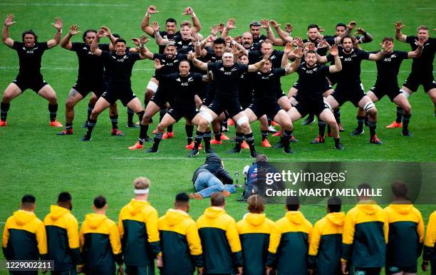 New Zealand players perform the haka before the start of the Bledisloe Cup rugby union match between New Zealand and Australia in Wellington on...