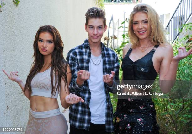 Brighton Sharbino, Sawyer Sharbino and Saxon Sharbino pose for photos during a photo shoot featuring the Sharbino family on October 10, 2020 in...