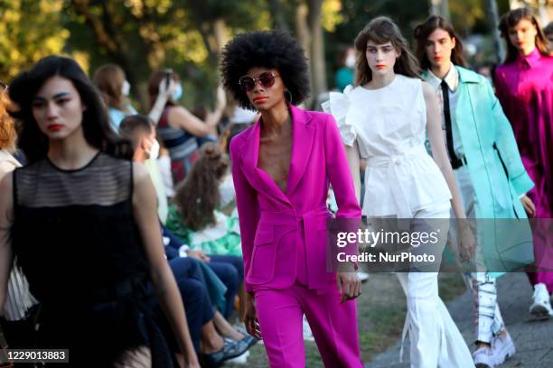 Models present creations from the Portuguese fashion designer Carlos Gil during the Lisbon Fashion Week - ModaLisboa Spring/Summer 2021 in Lisbon,...