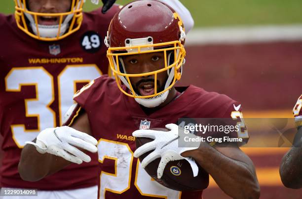 Kendall Fuller of the Washington Football Team celebrates after making an interception in the second quarter against the Los Angeles Rams at...