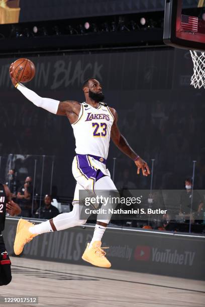 LeBron James of the Los Angeles Lakers dunks the ball against the Miami Heat during Game Six of the NBA Finals on October 11, 2020 at AdventHealth...