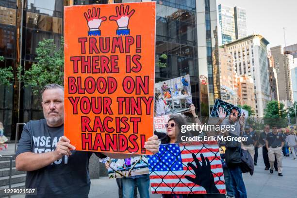 Activists in New York City used the opportunity on Trumps birthday with a demonstration outside the Trump International Hotel to peacefully draw...