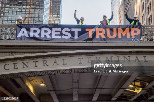 In protest of Trumps State of the Union speech on February 5 activists displayed 'ARREST TRUMP' banners inside and outside of Grand Central Terminal...