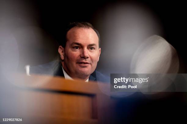 Sen. Mike Lee listens during Supreme Court Justice nominee Judge Amy Coney Barrett's Senate Judiciary Committee confirmation hearing for Supreme...