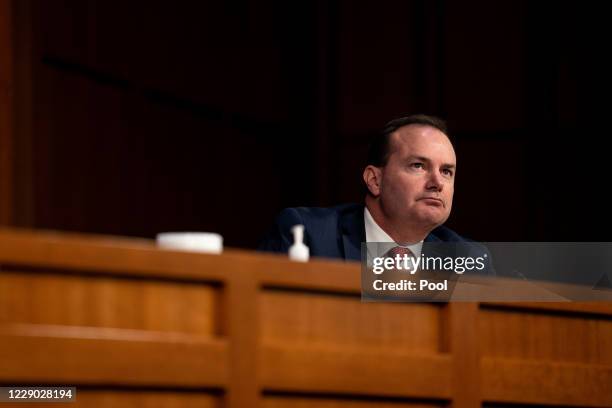 Sen. Mike Lee listens during Supreme Court Justice nominee Judge Amy Coney Barrett's Senate Judiciary Committee confirmation hearing for Supreme...