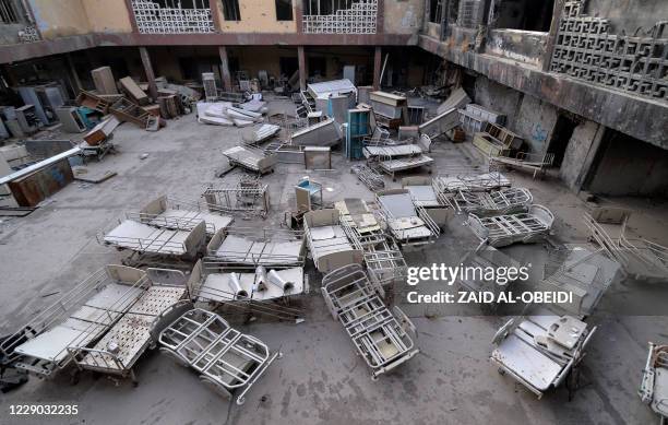 Medical equipment are pictured abandoned in the compound of the destroyed Mosul General Hospital on October 12, 2020 in northen Iraq. Iraq in...