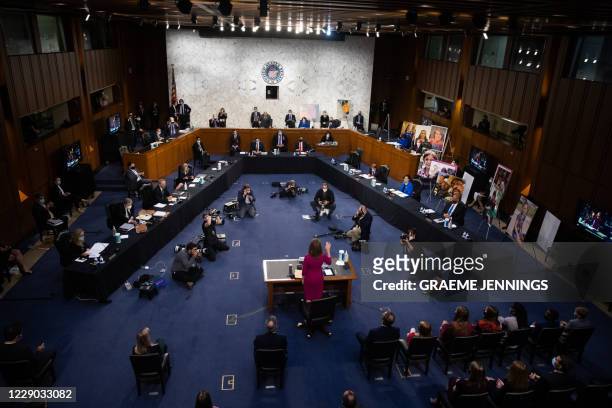 Supreme Court nominee Judge Amy Coney Barrett is sworn into her Senate Judiciary Committee confirmation hearing on Capitol Hill on October 12, 2020...