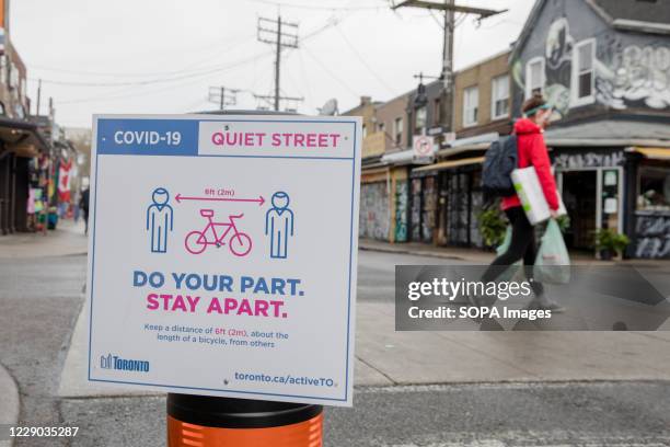 Sign reminding the public to keep a safe distance seen on the street. There are over 183,000 confirmed cases of Covid-19 and 9,625 deaths reported in...