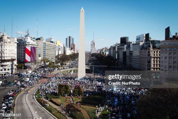 People take part in a protest against the government of Argentina's President Alberto Fernandez, in Buenos Aires, Argentina, on October 12, 2020 amid...