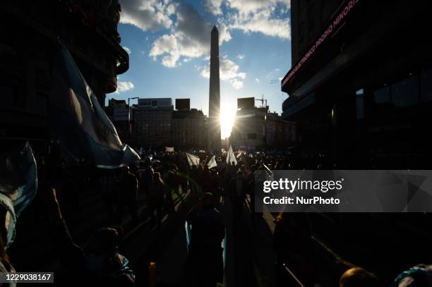 People take part in a protest against the government of Argentina's President Alberto Fernandez, in Buenos Aires, Argentina, on October 12, 2020 amid...