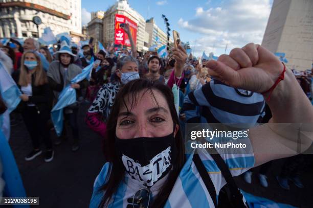 People take part in a protest against the government of Argentina's President Alberto Fernandez, in Buenos Aires, Argentina, on October 12, 2020 amid...