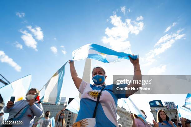 People take part in a protest against the government of Argentina's President Alberto Fernandez, in Buenos Aires, Argentina, on October 12, 2020 amid...