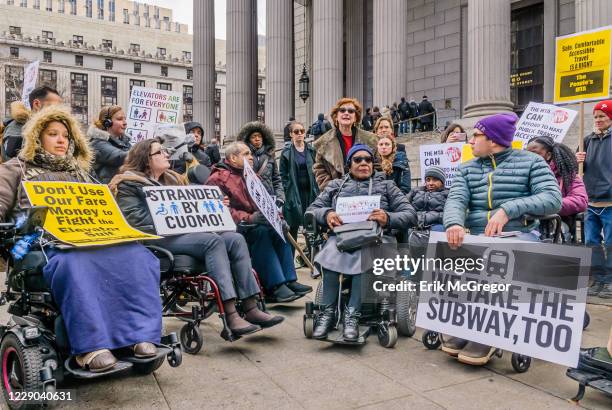Disabled New Yorkers were joined by disability advocacy groups and allies outside the New York Supreme Court at 60 Center Street to bring attention...