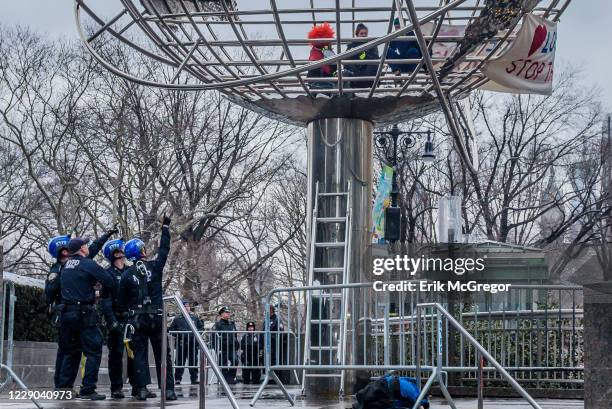 On the morning of Donald Trumps State of the Union address, January 30, 2018; a group of activist women climbed inside globe outside Trump...